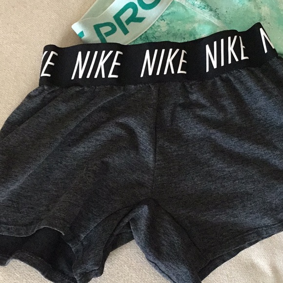 Two pairs of Nike shorts medium for both! - Picture 2 of 5
